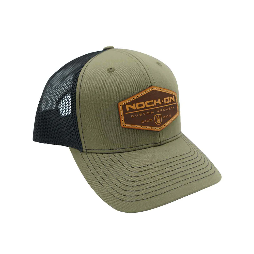 Nock On Manifest Hat, Richardson 112 hat, loden black snapback, top grain leather patch hat, breathable mesh back cap, archery hat, outdoor snapback, stylish snapback hat, durable cotton polyester hat, pre-curved visor hat, contrast stitched visor, adjustable snapback closure, mid-profile hat, six-panel hat, Nock On gear, archery apparel, high-quality snapback, versatile outdoor hat.